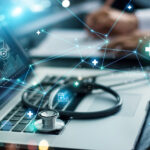 Doctor analyzing medical of business report and medical examination with network connection on laptop screen.